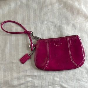 Hot pink Coach wristlet